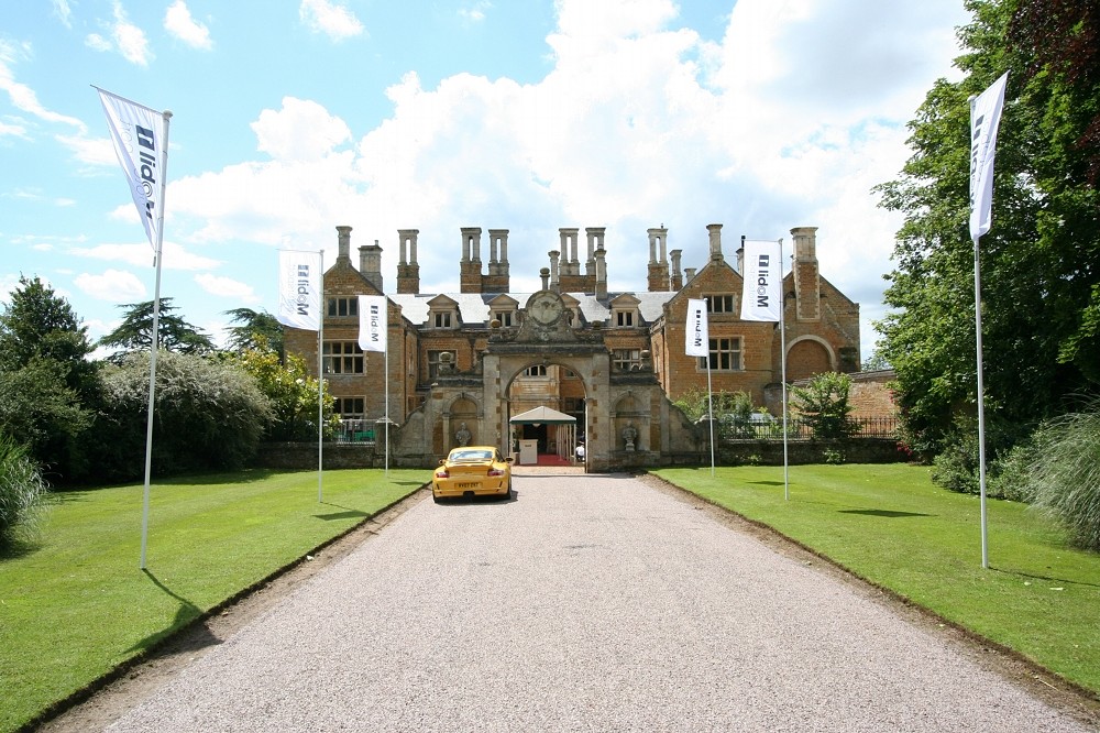 Flags flying on flagpoles at F1's McLaren-Mercedes