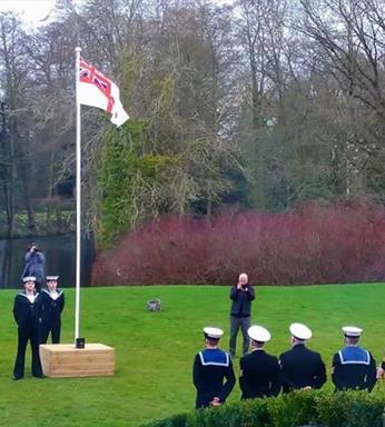 flagpole in a box at a navel wedding