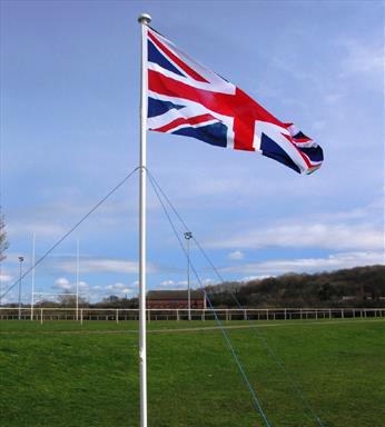 portable_flagpole_with_flag_flying