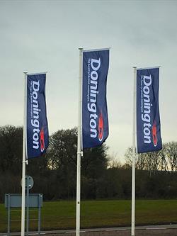 Classic fibreglass flagpole with flag arm at Donnington race course