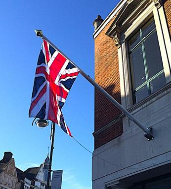fibreglass flagpole wall mounted with a Union Jack flying in London