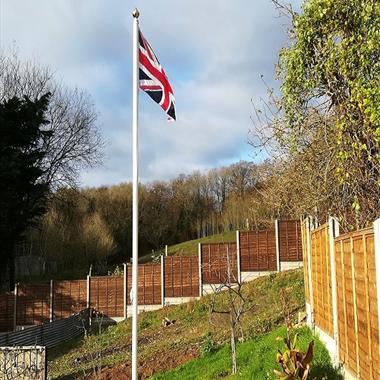 image_of_white_classic_aluminium_flagpole_flying_a_union_jack_flag