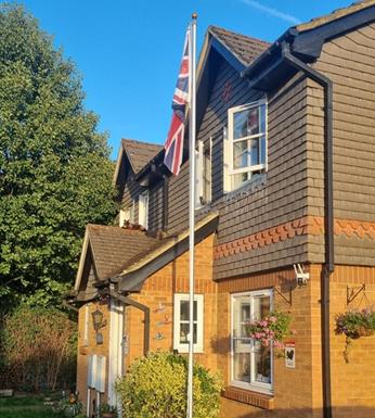 UK garden flagpole with a union jack flag