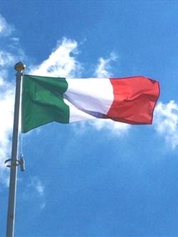 national flag of Italy flying from a flagpole